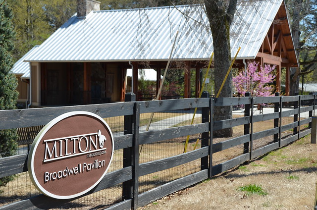 Milton sign on fence